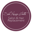 She Never Tells Logo